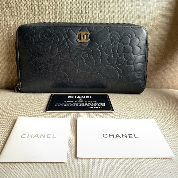 CHANEL Handbags - Chanel black zippy camellia wallet with auth card